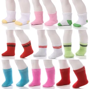 Set of 9 colorful striped and solid socks for 18-inch girl dolls shown on doll legs