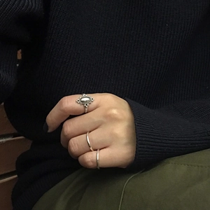 Retro Thai silver oval engraved rings and minimalist bands set on finger