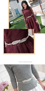 Detail shot of a silver elastic leaf-shaped metal belt buckle on a dress