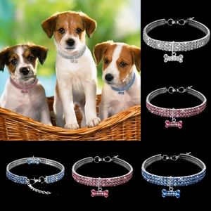 Three-row rhinestone pet collar with bone pendant, available in white, pink, and blue