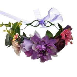 Detailed view of handmade silk rose headband with mixed berries and purple ribbons