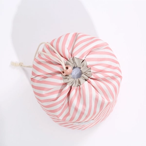 Pink and white striped cylindrical drawstring makeup bag made of oxford travel fabric