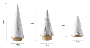 Three-piece marble ceramic cone ornaments with gold bases in small, medium, and large sizes