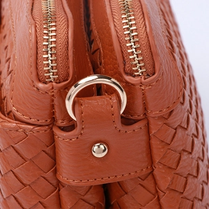 Brown hand-woven shoulder bag with dual zipper compartments and gold metal hardware detail