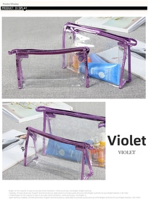 Detail view of two transparent PVC toiletry bags with purple trim and cosmetics inside