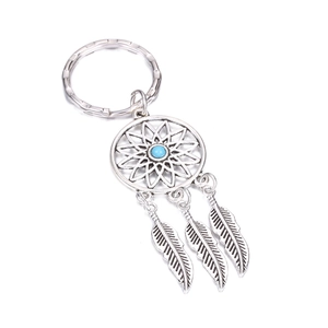Silver dreamcatcher keychain with sky blue bead and detailed feather charms on white background