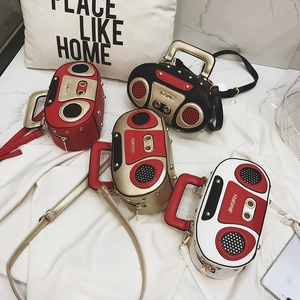 Detailed arrangement of creative vintage radio shape handbags in four different colors