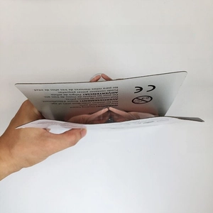 Detail of thickened packaging cardboard with CE safety certification and multi-language warnings