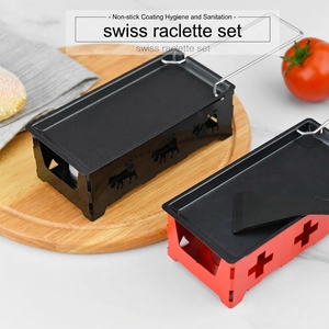Swiss raclette set with non-stick pans and candle-heated base for cheese melting