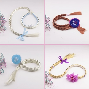 Detail view of four children's princess hairbands with synthetic braids and floral accents