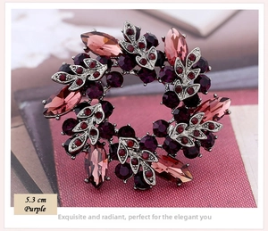 Detailed close-up of a 5.3 cm purple crystal floral brooch with intricate leaf texture
