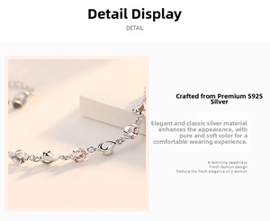 Detailed macro view of S925 sterling silver heart bracelet with sparkling cubic zirconia