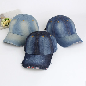 Three shades of washed denim baseball caps with vintage distressed torn brim detail