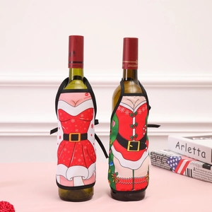 Mini Christmas apron wine bottle covers with festive snowflake and holly patterns
