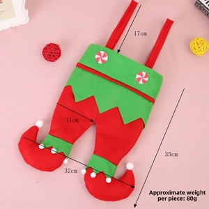 Dettaglio del sacchetto regalo elfo di Natale con dimensioni e decori pompon