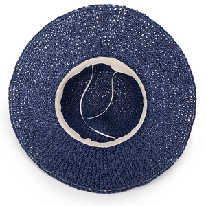 Navy blue hand-woven straw sun hat for women with wide brim and interior adjustment cord