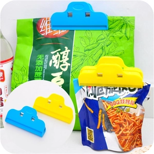 Set of colorful plastic sealing clips for food bags in blue and yellow colors