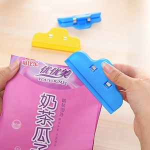 Set of colorful plastic food bag sealing clips for snacks shown in blue and yellow colors