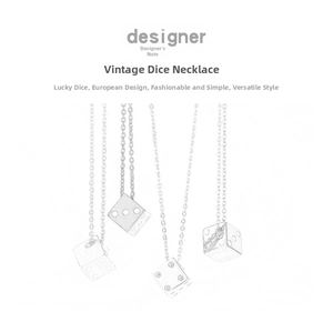 Detailed view of vintage minimalist dice pendants with intricate engraved star patterns
