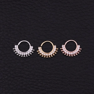 Ethnic style sunburst nose rings with clear zircon crystals in silver, gold and rose gold