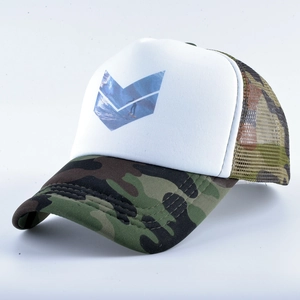 Detail view of camouflage mesh trucker hat featuring a blue double-V surfing graphic