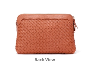 Detailed back view of the caramel hand-woven shoulder bag with a secure metal zipper closure