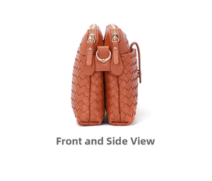 Detail view of woven texture crossbody bag with double zipper and golden metal hardware