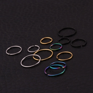 Surgical 316L stainless steel nose and ear cartilage rings in silver, gold, and black