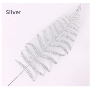 Detailed view of silvery glitter artificial Persian leaf for Christmas tree decoration