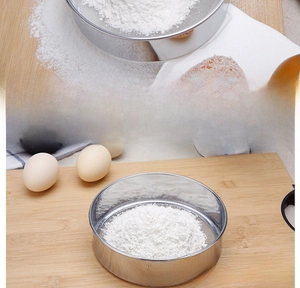 Close-up of 60 mesh stainless steel flour sifter for baking with fine wire mesh detail