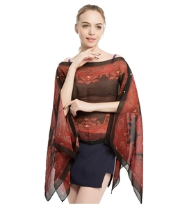 Detail of red paisley chiffon sun protection shawl showing light semi-transparent texture