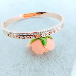 Rose gold titanium steel bracelet with Roman numerals and pavé cubic zirconia inlay