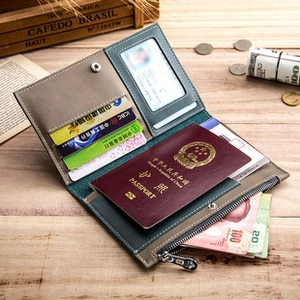 Detail showing inner leather compartments for passport, cards and zipper pocket