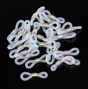 Detail of translucent silicone loops and silver metal coils for eyewear chain connector