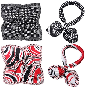 Detail showing classic polka dot and modern wave pattern satin square silk scarves