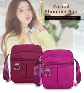 Detailed view of lightweight waterproof nylon crossbody bag with multi-zipper pockets