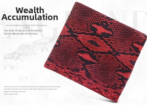 Close-up of men's bifold wallet featuring striking red and black faux snakeskin texture