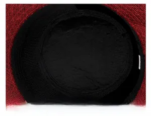 Detailed interior view of linen sun hat featuring breathable black sweatband and red mesh