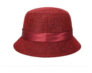 Detailed back view of dark red linen sun hat featuring a decorative satin ribbon trim