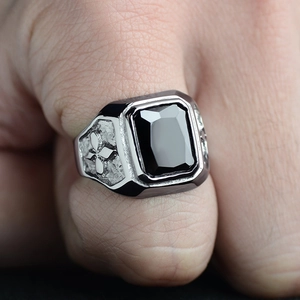 Men's vintage stainless steel ring with rectangular black onyx and relief cross patterns