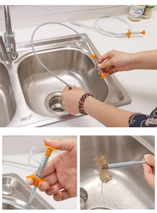 Flexible drain grabber tool with orange handle and four claws picking up sink debris