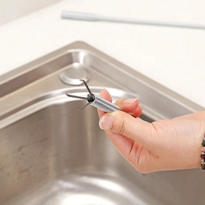 Flexible metal spring reacher tool with four-claw grabber for sink drain cleaning