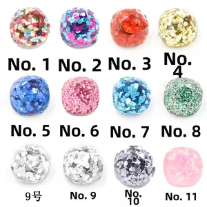 Detail showing twelve colors of sparkling resin cabochons for DIY jewelry making
