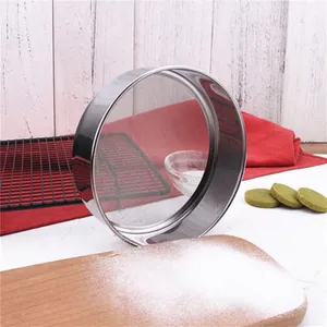 304 stainless steel fine mesh flour sifter for baking on a rustic wooden table