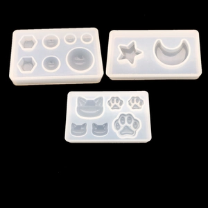 Three-piece DIY silicone resin mold set featuring cat paws, moon, stars and geometry