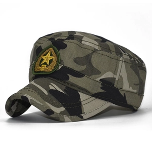 Close-up of camouflage patrol cap featuring golden star embroidery and military patterns