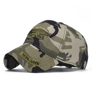 Detailed view of military camouflage baseball cap featuring Navy Seal embroidery on the brim