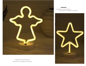 Macro view of LED angel and star neon lights with warm glow and circular base