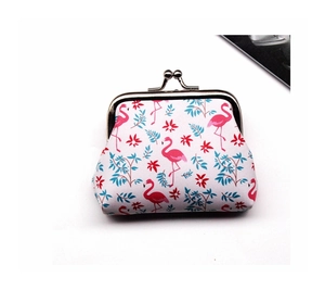 Detail of pink flamingo print on a mini coin purse with silver metal clasp closure