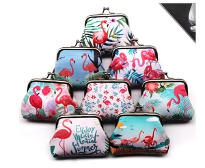 Various flamingo prints on vintage kiss-lock coin purses with tropical summer motifs